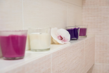 candles in the bathroom in the form of an orchid