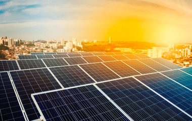 Solar energy power plant over a beautiful sundown sky