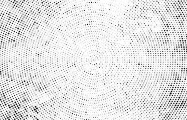 Abstract radial halftone texture. Monochrome background of black dots on white.
