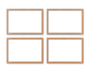 Set of 4 horizontal wooden frames mockup hanging on the wall. Empty base for picture or text. 3D rendering.