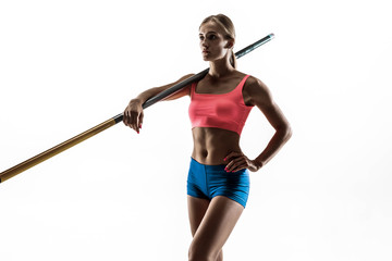 Power and beauty and purity. Professional female pole vaulter training on white studio background. Fit and slim female model practicing. Concept of sport, healthy lifestyle, action, movement, motion.