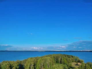 Fototapeta premium Aerial view of the lake and islands near Yunost sanatorium in Honoles, Minsk Region of Belarus
