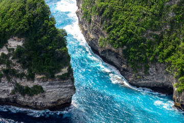 The small strait of rock island in Kelingking Beach, Penida Island, Bali, Indonesia.