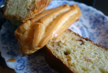 Pieces of cake on plate with blur effect.