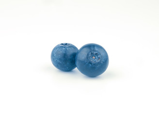 two blueberry fruit on white background