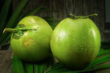 fresh coconut fruit with water dropping