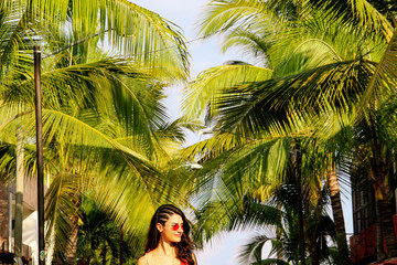 Colorful street with palm trees in Sayulita, Mexico