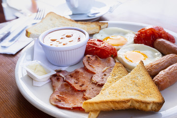 Egg and Toast - classical english breakfast with egg and ham