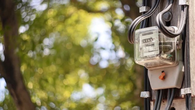 Electric meter on the background, bokeh blur
