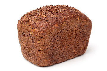 Loaf of rye bread with linseeds and sunflower seeds