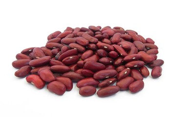 Shelling red beans on white isolate close up