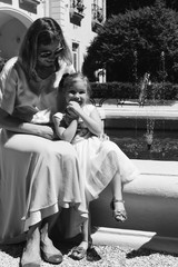 Obraz premium Happy mother and daughter monochrome outdoor portrait 