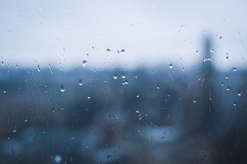 raindrops on the window in blue