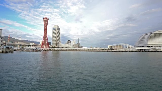 Horizontal pan of Kobe harborland, modern development