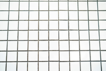 White striped grid on table. Striped square pattern