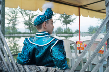 Fototapeta premium circumcision boy dressed in traditional clothing