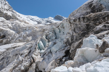 Mountain glaciers and large blocks of snow with ice in the eternal glaciers in Alibek, Dombay,...