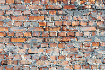 Brick wall. Old bricks wall. Wall in bricks with cement. Red bricks wall. Orange brick.
