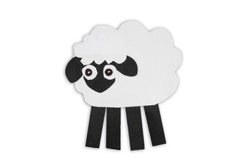 White sheep cut out of paper isolated on white background.