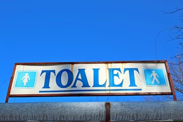 Old toalet sign with frame - obrazy, fototapety, plakaty