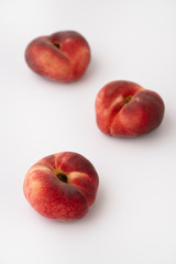 Fototapeta na wymiar Fresh organic saturn peaches