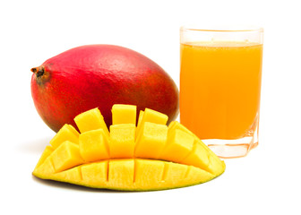 Naklejka na ściany i meble Mango juice with mango cubes Isolated on a white background. Glass of mango juice.