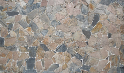 Gray stone wall texture or background material of industry construction, rough surface.