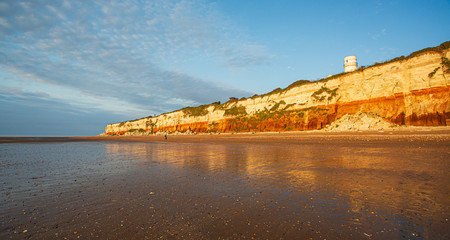The famous red and white chalk cliffs of Hunstanton in Norfolk, England.