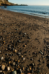 Rocks and sand on the beach near Killiney, Dublin. Irish Sea, Ireland