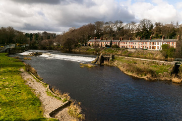 Fototapeta na wymiar Lucan Weir on the river Liffey at Lucan, Dublin