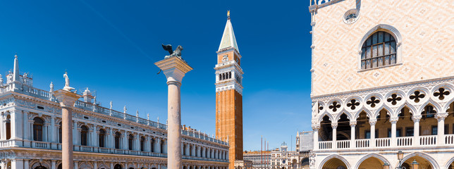 Venice: Panoramic view of San Marcos square and tower with blue sky