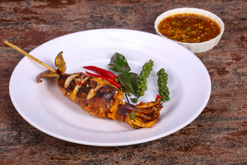 Grilled squid with sauce and hebs