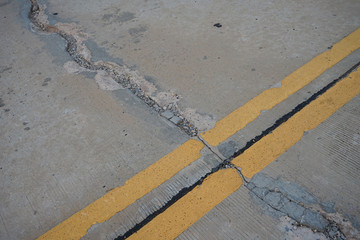 Concrete road cracks waiting for repairs