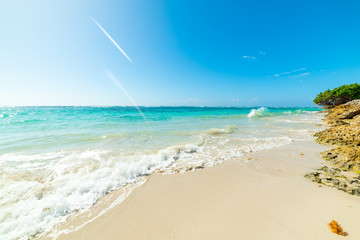 Small wave in Raisins Clairs beach in Guadeloupe