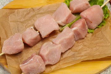Raw pork meat skewer for grill