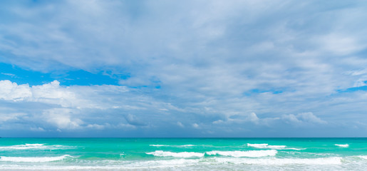 Overcast sky over Miami Beach turquoise sea