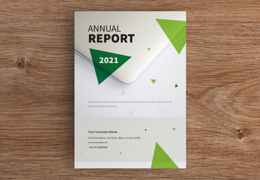 Annual Report Cover Layout with Green Triangles and Photo of a Laptop