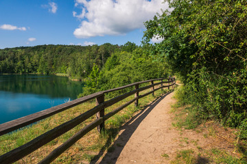 Fototapeta na wymiar Turquoise lake in Wolinski National Park, Wapnica, Poland