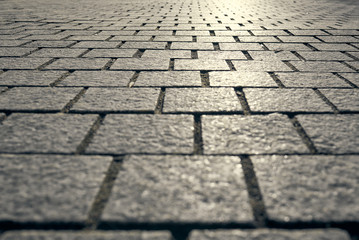 Abstract background - gray paving slabs in the form of squares.