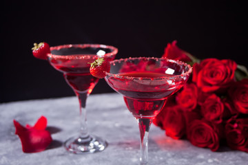 Red exotic alcoholic cocktail in clear glasses