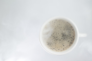 Top view, drink glass with heat smoke on a white background