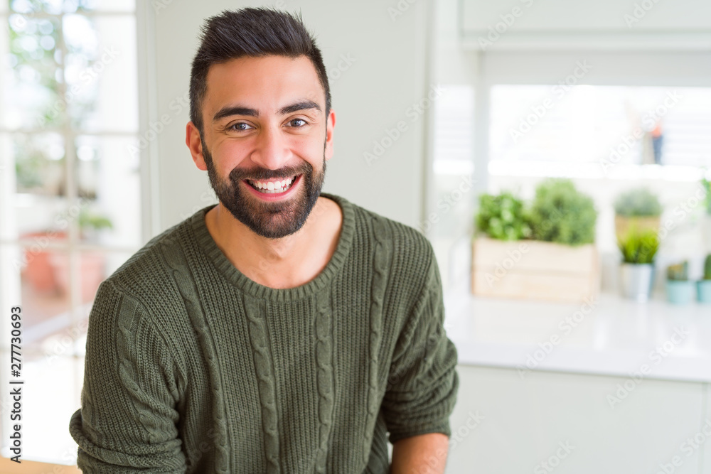 Sticker handsome man smiling cheerful with a big smile on face showing teeth, positive and happy expression