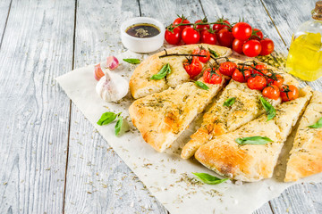 Focaccia with tomatoes and basil