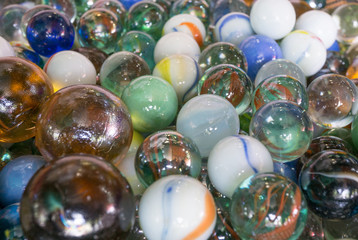 Group colorful glass marbles ball different color for decorate garden or fish aquarium,multi color abstract background,transparent oval shape crystal ball rainbow