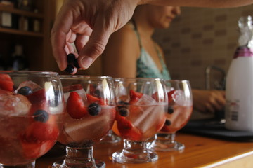 Cocktail with ice and fruits