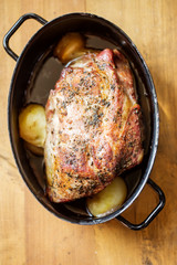 Roast pork shoulder with onion 