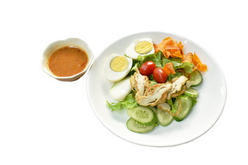 Islamic salad vegetable and boiled egg topping crispy fried taro dressing sweet bean sauce halal food on plate