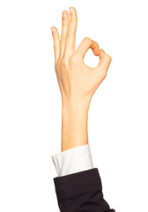Businesswoman's counting hand with zero gesture on white