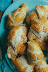 italian croissants with berries on a blue background homemade baking