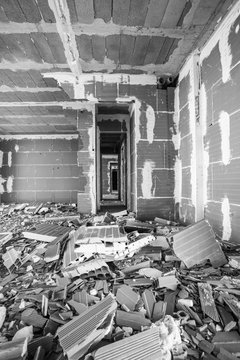 Heap of broken panels placed in building under construction